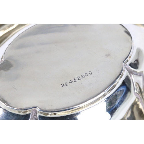 275 - A fully hallmarked sterling silver bonbon dish together with a hallmarked silver pin dish, both assa... 