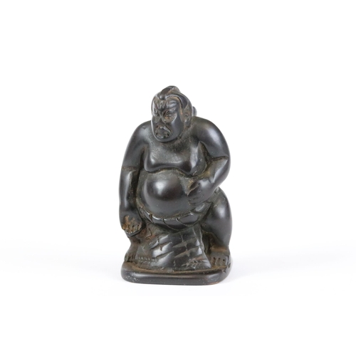 277 - A collection of Japanese carved wooden netsuke and miniature wood and resin figures.