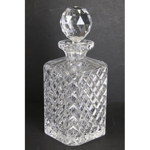 85 - Selection of glass to include Waterford crystal claret decanter with handle on footed base, Otard co... 