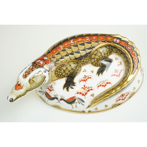 11 - Royal Crown Derby Imari pattern paperweights in the form of crocodile MMIII with gold stopper, puffi... 