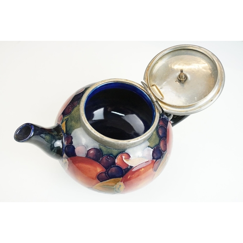 16 - Moorcroft pomegranate pattern teapot with hammered pewter hinged lid, H 12cm