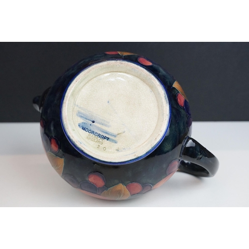 16 - Moorcroft pomegranate pattern teapot with hammered pewter hinged lid, H 12cm