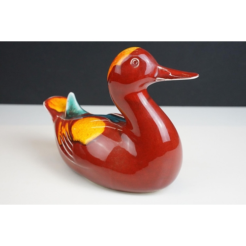 19 - Poole Pottery pair of two living glaze duck figurines and Odyssey purse vase, H 18cm