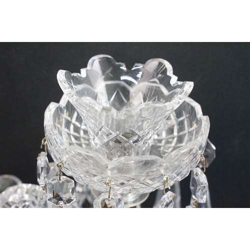 22 - Pair of Waterford crystal candelabras with centre spine and two scrolled arms with prism droplets