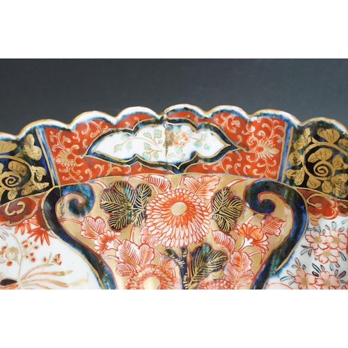 25 - Large Imari pattern scalloped gold detail bowl with decorative panels and centre butterflies, diamet... 