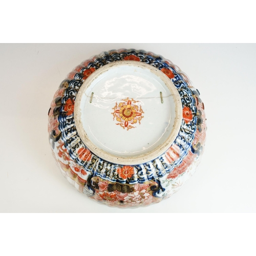 25 - Large Imari pattern scalloped gold detail bowl with decorative panels and centre butterflies, diamet... 