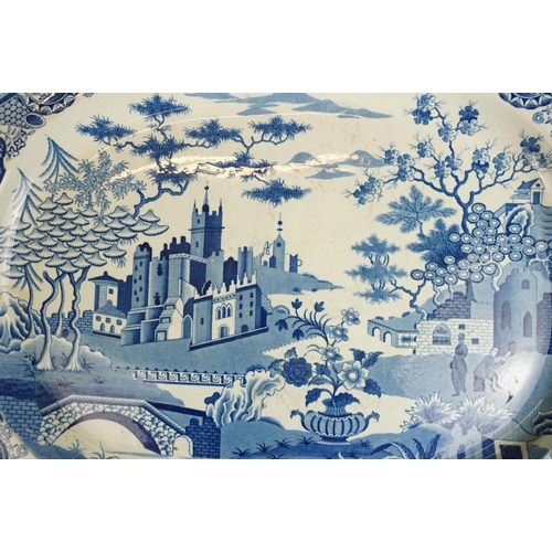 28 - 19th century octagonal blue and white meat platter with Gothic landscape and oriental gardens, W 51c... 