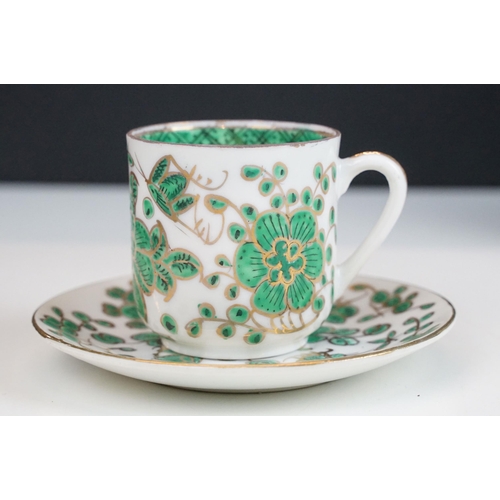 30 - Twelve Chinese green and gold style coffee cups and saucers