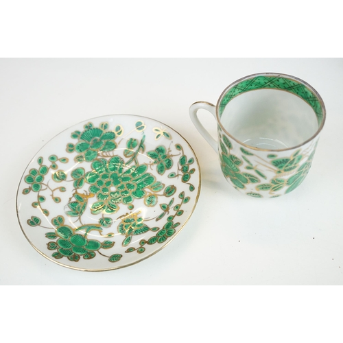 30 - Twelve Chinese green and gold style coffee cups and saucers