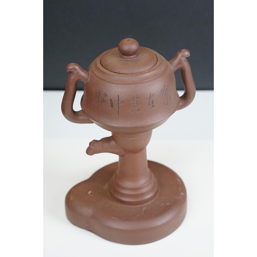 32 - Terracotta Chinese teapot with bamboo motif and six small cups, marked to base together with four Ch... 