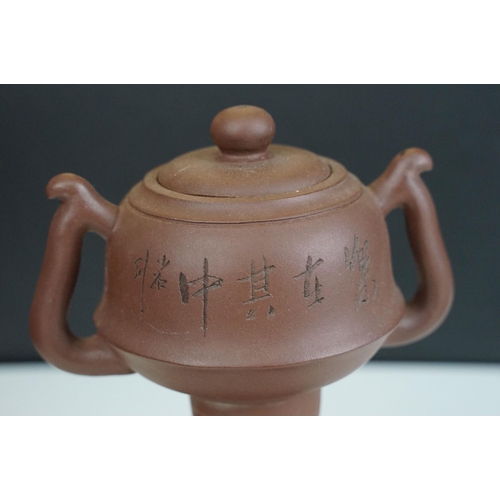 32 - Terracotta Chinese teapot with bamboo motif and six small cups, marked to base together with four Ch... 