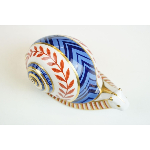 4 - Royal Crown Derby paperweights to include snail XLVIII with white stopper, Harbour seal limited edit... 