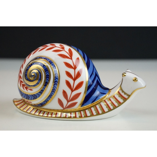 4 - Royal Crown Derby paperweights to include snail XLVIII with white stopper, Harbour seal limited edit... 