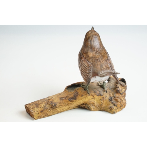 45 - Bird figurines to include Song Thrush and English Robin on wooden branch examples, signed to base, t... 