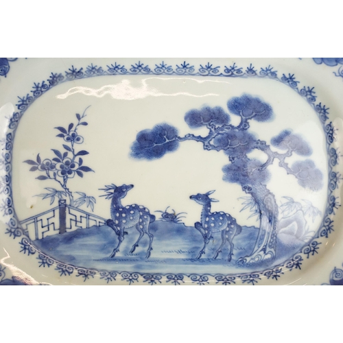 46 - 18th century blue and white Chinese platters with deer and landscape scenes, W 31cm