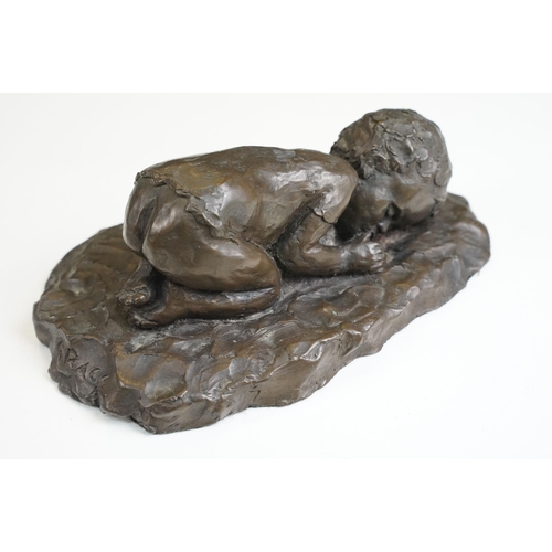 48 - Resin sculpture of sleeping infant by Grace Critchley, Dorman's studio, approx. H 6.5cm, W 17.5cm, D... 