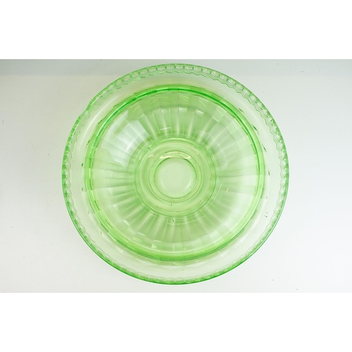 51 - Green glass rose posey flower bowl, diameter 32cm together with a uranium glass art deco lady figuri... 