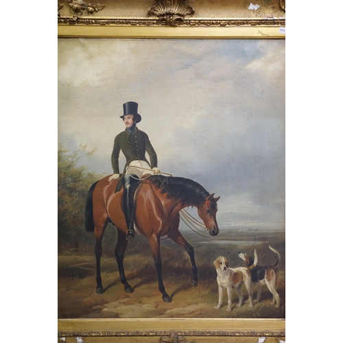 511 - 19th century English school, portrait of a gentleman on horseback with two hounds, oil on canvas, in... 