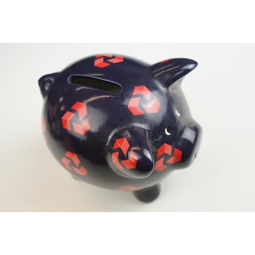 57 - Natwest Wade piggy bank collection of six characters with stoppers an all over print example