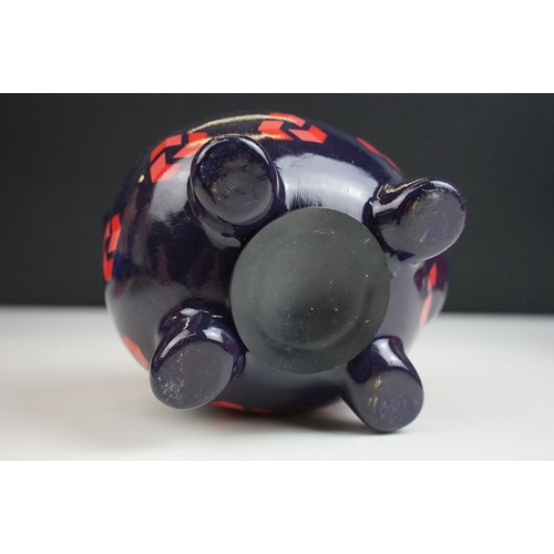 57 - Natwest Wade piggy bank collection of six characters with stoppers an all over print example