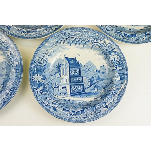 61 - Set of four blue and white soup bowls depicting a landscape with workers and building scene, diamete... 