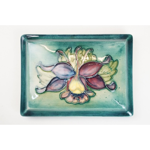 65 - Moorcroft small pomegranate vase, signed to base, H 11cm together with a Moorcroft rectangular pot l... 