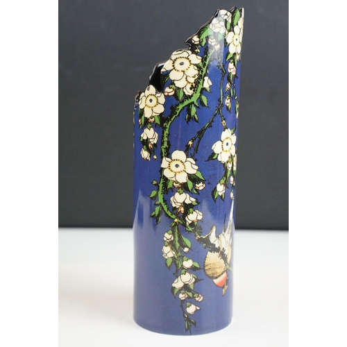 65 - Moorcroft small pomegranate vase, signed to base, H 11cm together with a Moorcroft rectangular pot l... 