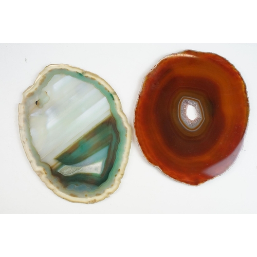 68 - Collection of geode slices together with an assortment of carved and polished mixed stone eggs