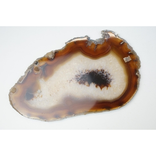 68 - Collection of geode slices together with an assortment of carved and polished mixed stone eggs