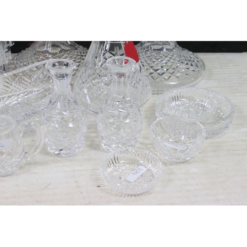 72 - Collection of cut glass to include decanters, ship's decanters, graduating dishes and bowls