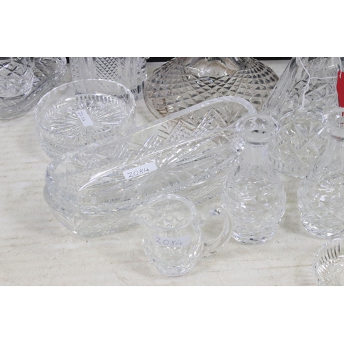 72 - Collection of cut glass to include decanters, ship's decanters, graduating dishes and bowls