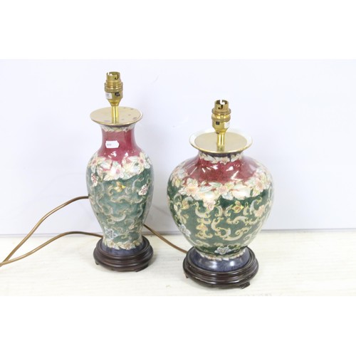 453 - Selection of lamp bases to include oriental ginger jar styles atop wooden bases, two spherical glass... 