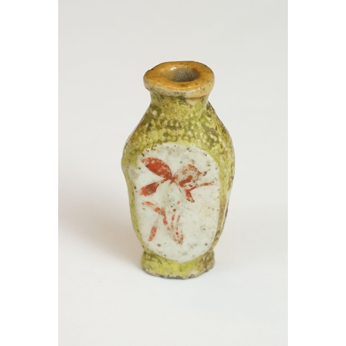 211 - Chinese tiger's eye feng shui ingot, 3.5cm high, a Chinese scent bottle and lid painted with a figur... 