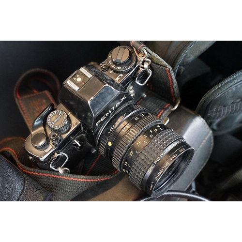 439 - Group of three Pentax 35mm SLR cameras, featuring Pentax LX, Pentax Sportsmatic SPII, Pentax SF7 tog... 