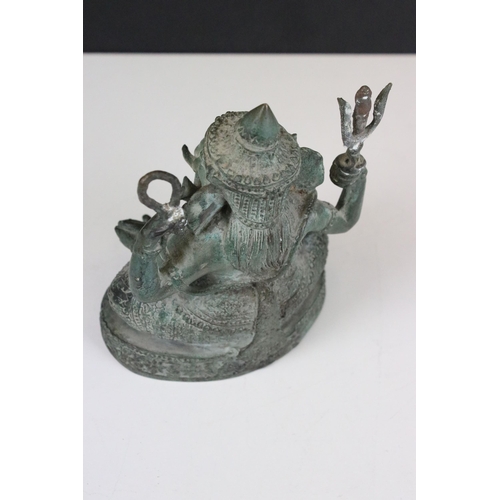 104 - Ganesh four armed seated god statue, H 15cm