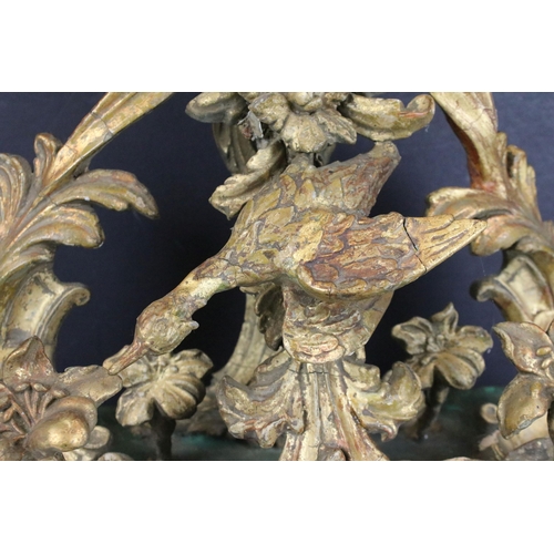 119 - Large gilt wood baroque sculpture depicting bird and flower arrangement on large plinth, H 39cm