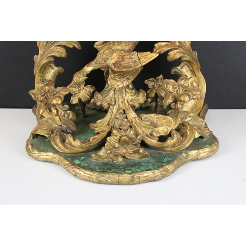 119 - Large gilt wood baroque sculpture depicting bird and flower arrangement on large plinth, H 39cm