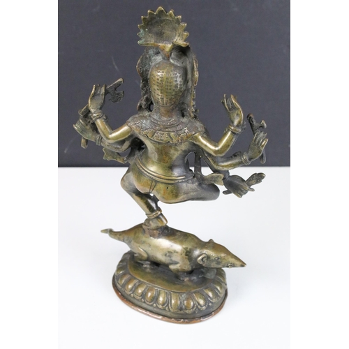 120 - Brass dancing standing Ganesha god temple statue with six arms on mouse, H 29cm