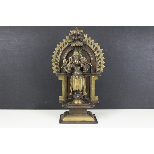 121 - Brass Hindu standing Ganesh four armed god statue, H 36cm