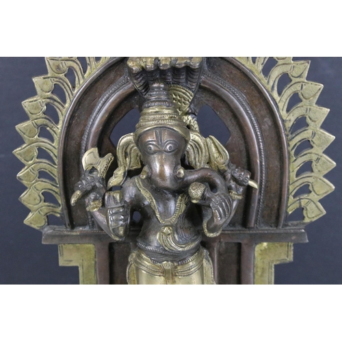 121 - Brass Hindu standing Ganesh four armed god statue, H 36cm