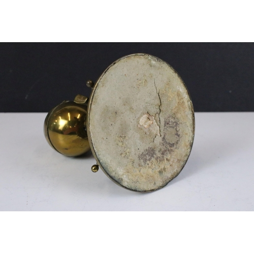 137 - Brass boy and ball on carpet inkwell on stand, H 14cm