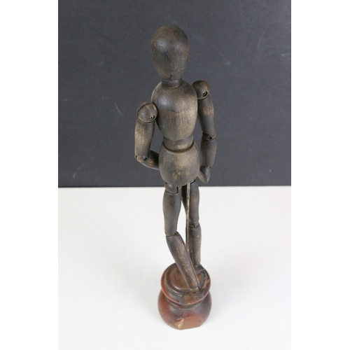 145 - Artists wooden articulated artist shop display lay figure on stand, H 38cm