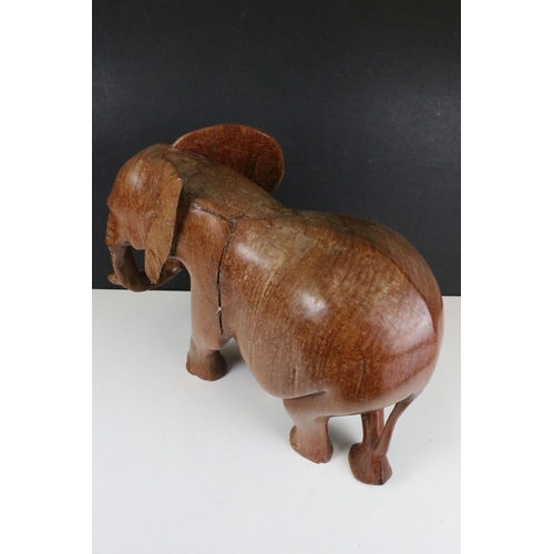 146 - Large carved wood elephant and calf sculpture, H 37cm