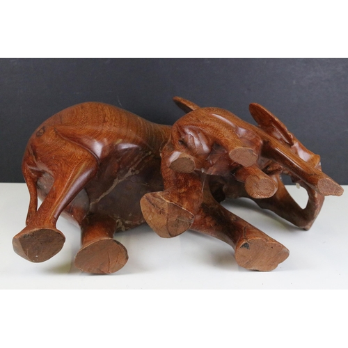 146 - Large carved wood elephant and calf sculpture, H 37cm