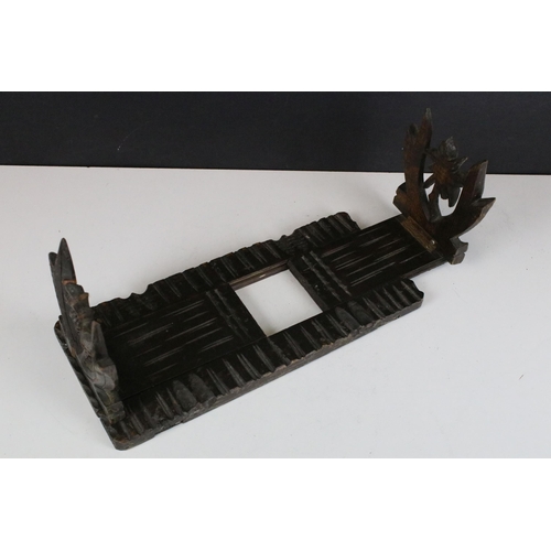 148 - Black Forest carved wooden bookslide