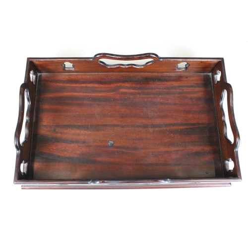 152 - The Libra Company wooden gallery serving tray with cut out detail and handles, H 8cm, W 40cm, D 24.5... 