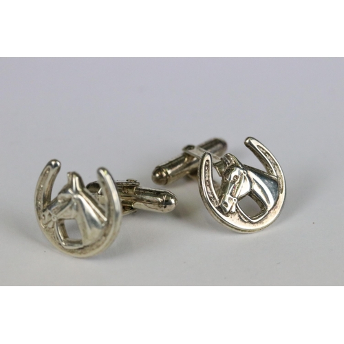 167 - Pair of silver equestrian cufflinks in the form of a horse head within a horse shoe, Birmingham hall... 