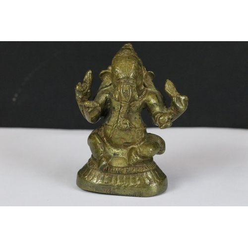 179 - A collection of six Indian cast metal ornamental figures of the Hindu elephant god Ganesha.