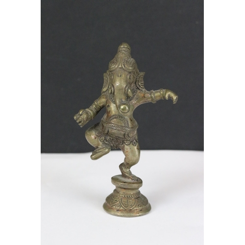 179 - A collection of six Indian cast metal ornamental figures of the Hindu elephant god Ganesha.