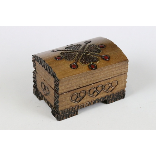 187 - A collection of three wooden trinket boxes of various sizes and forms. Largest measures approx 11cm ... 